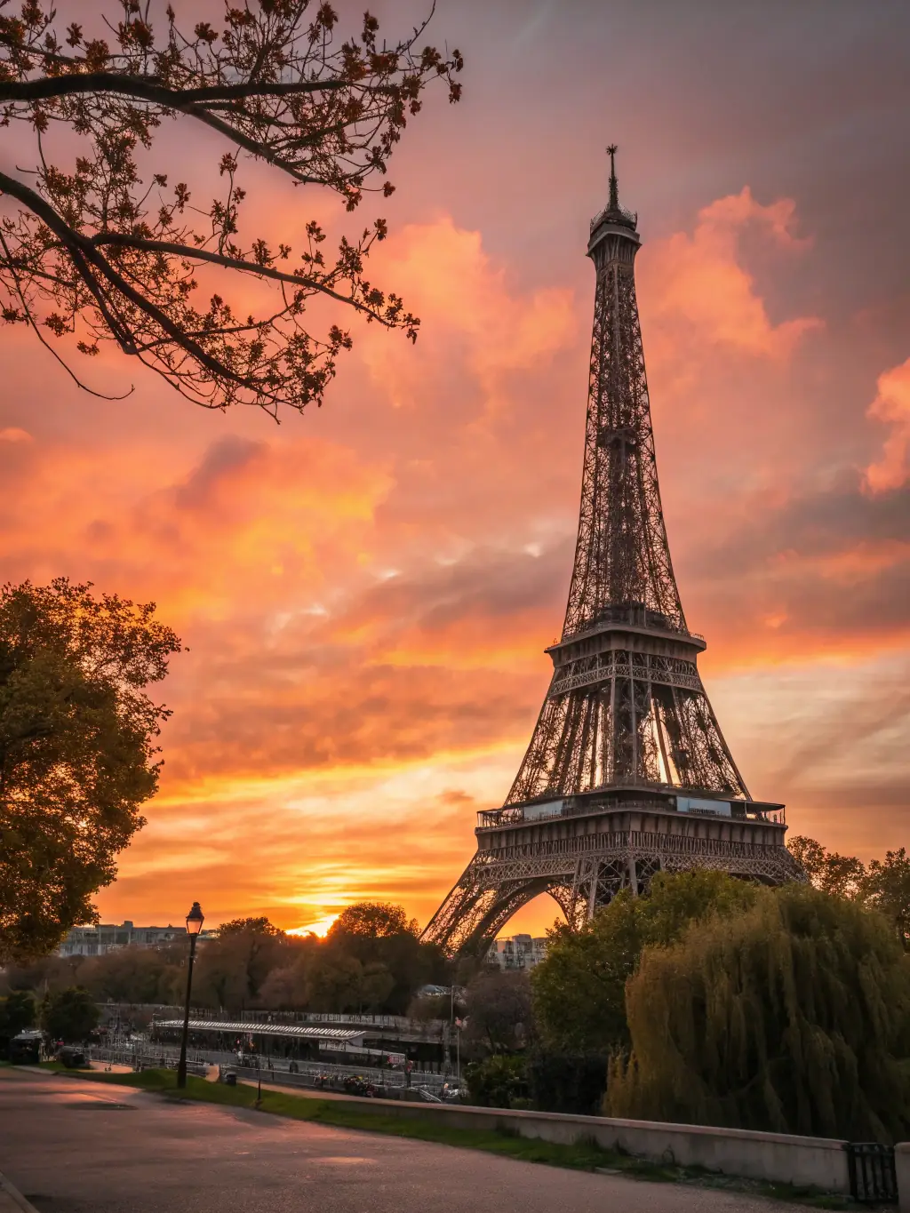 An image of the Eiffel Tower in Paris, with a couple enjoying the view, representing Nkwimba Company Limited's international travel options.