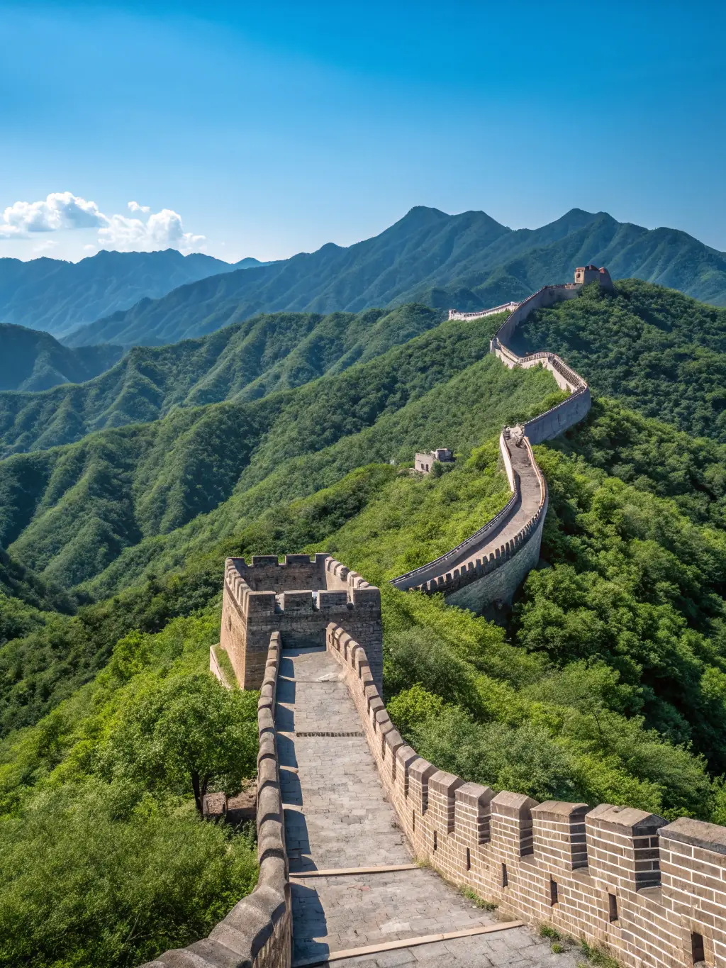 A captivating image of the Great Wall of China winding through the mountains, representing Nkwimba Company Limited's international travel options.